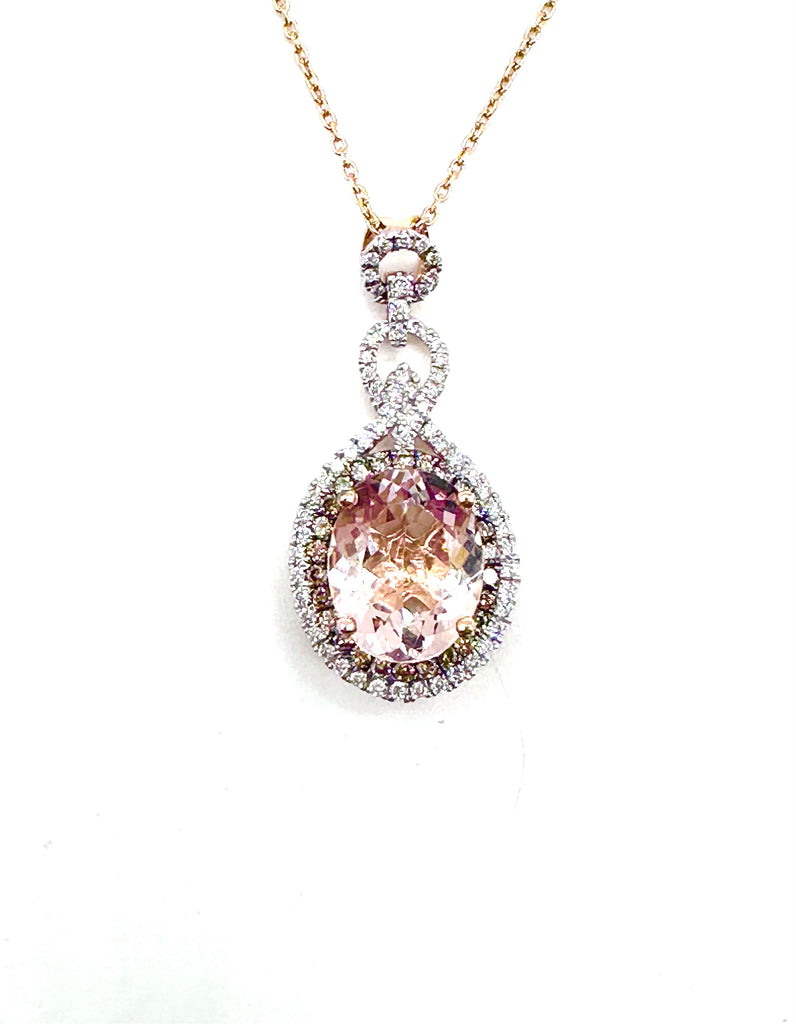 Pink gemstone necklace with gold chain on a white background