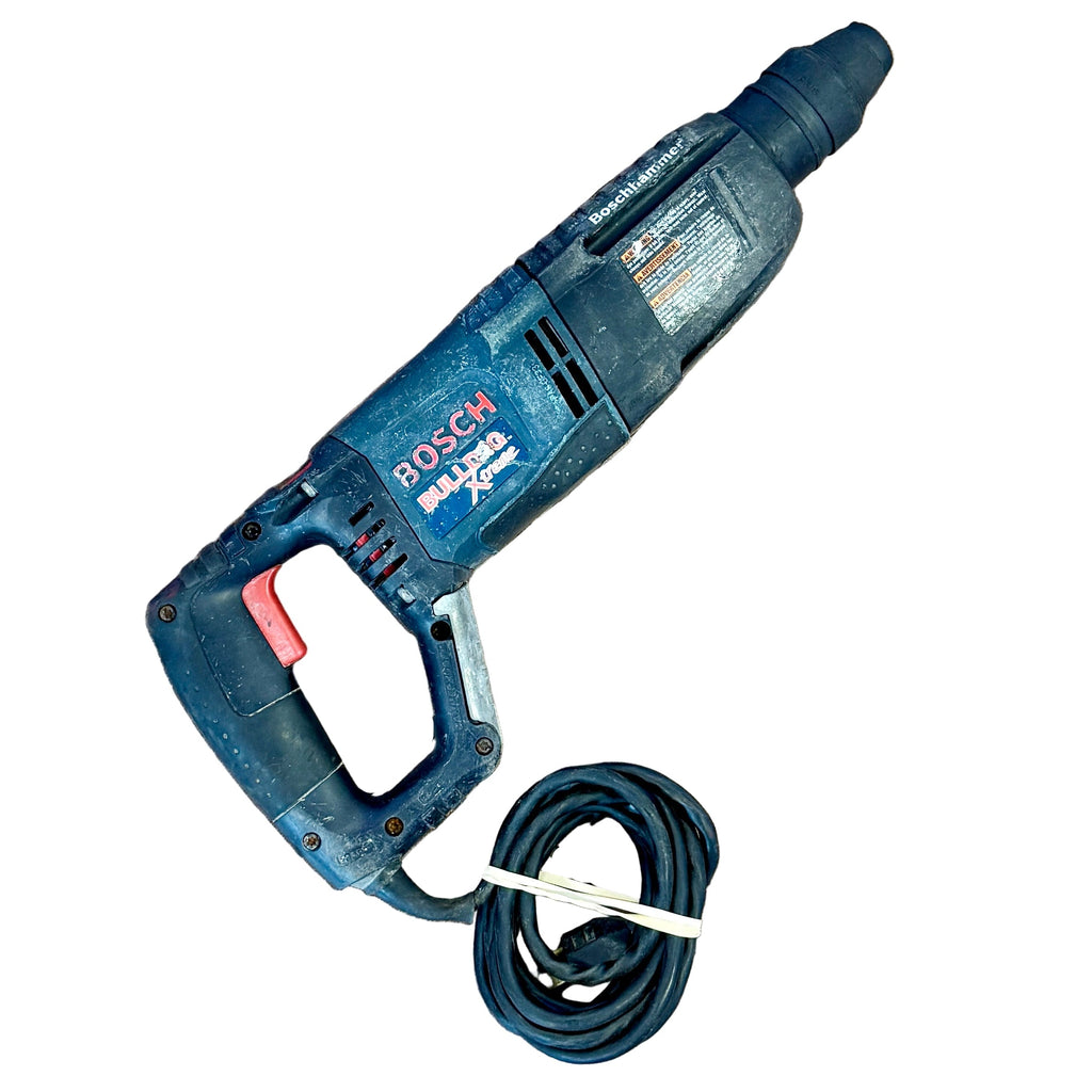BOSCH BULLDOG Xtreme 7.5-Amp 1" Corded SDS-Plus Variable Speed Rotary Hammer Drill (11255VSR) Bosch power drill on a tiled floor