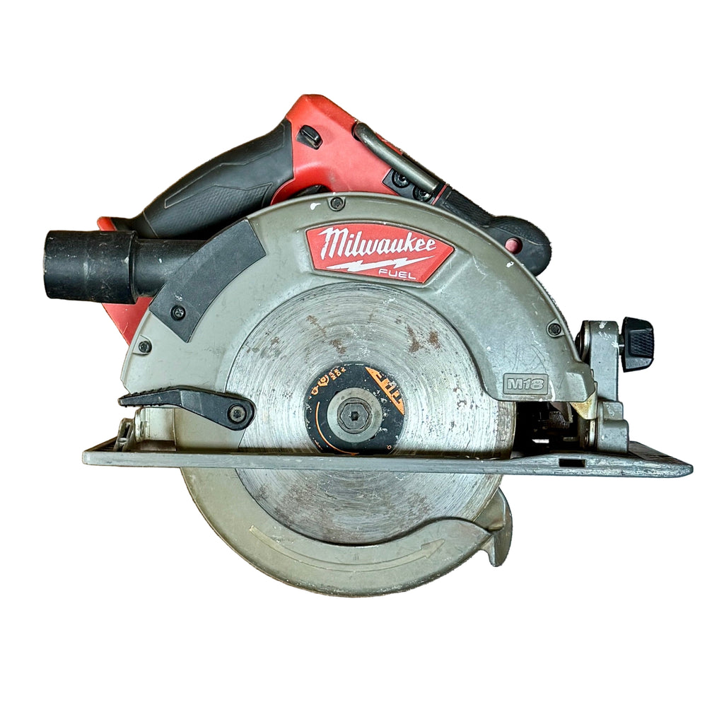 Milwaukee M18 FUEL 18V 7-1/4" Brushless Cordless Circular Saw w/ Battery & Charger (2732-20) Milwaukee circular saw on a wooden floor