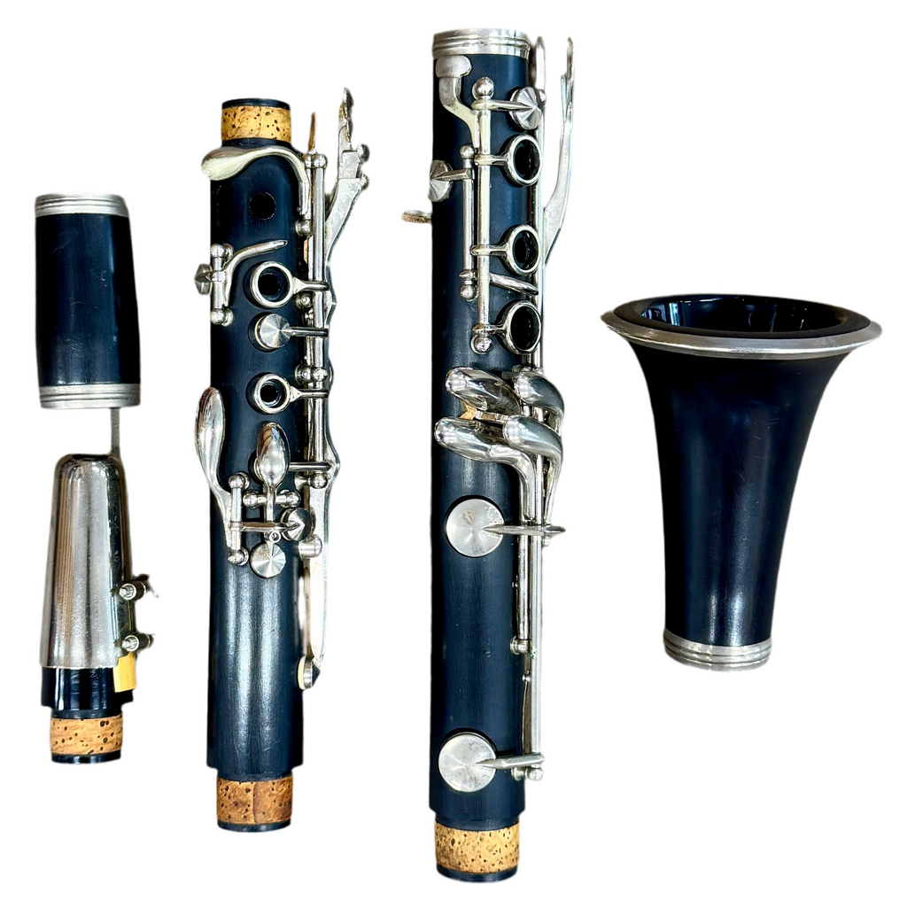 Henkin Bb Clarinet w/ Hard Case Clarinet with its parts on a white background