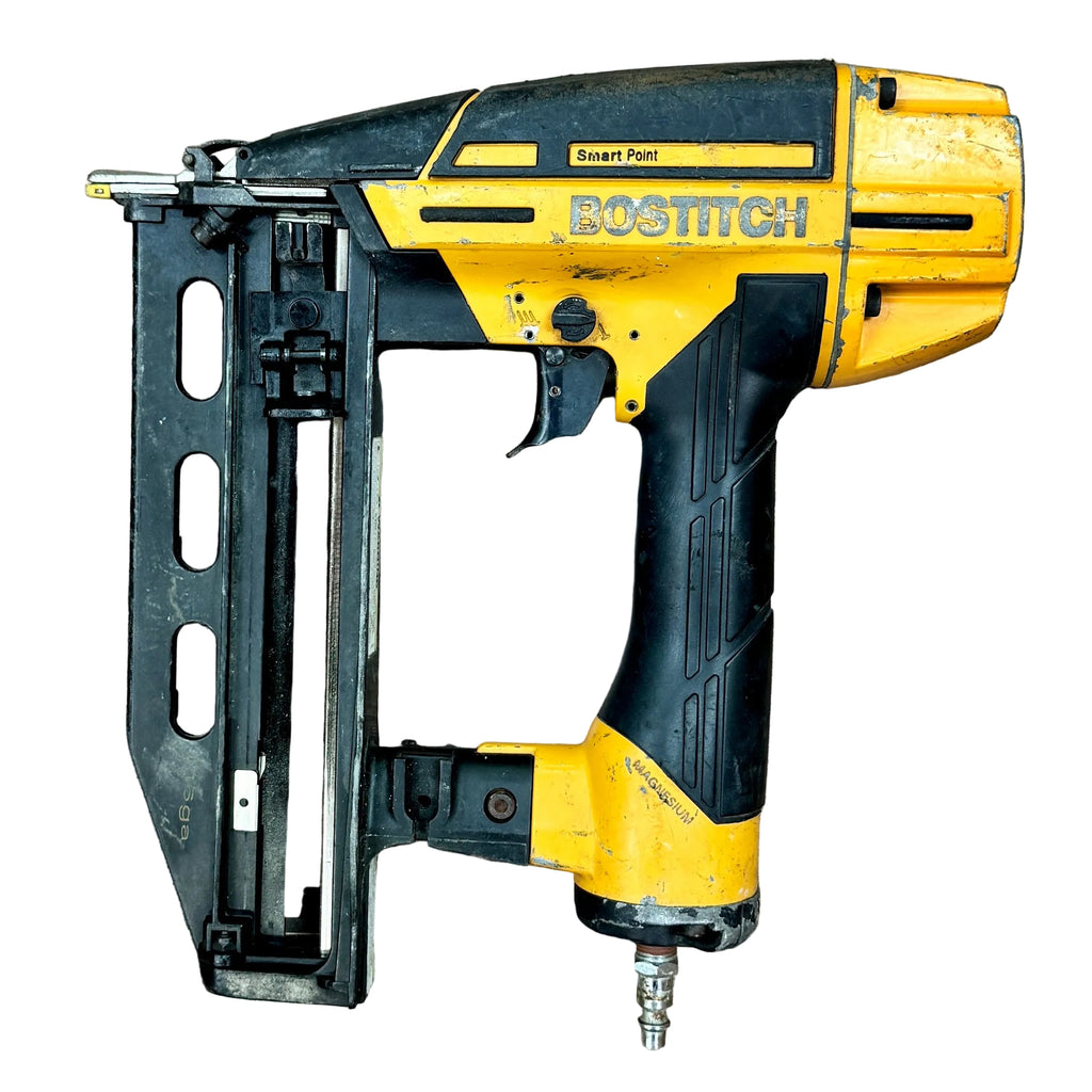 BOSTITCH Smart Point 16-Gauge 2-1/2" Pneumatic Straight Finish Nailer (BTFP71917) Yellow and black Bostitch nail gun on a wooden surface