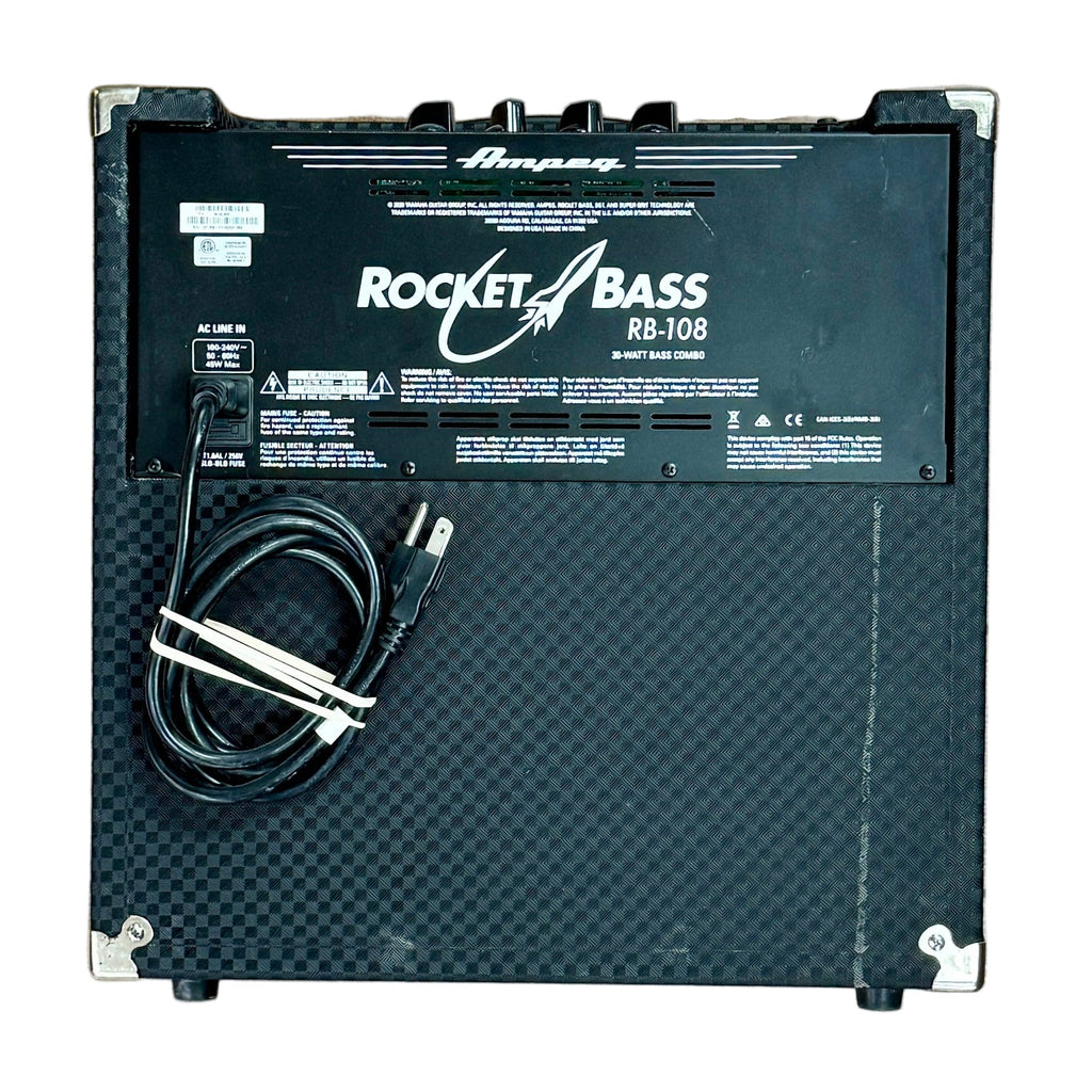 Ampeg ROCKET BASS RB-108 Bass Combo Amplifier Black amplifier with 'Rocket Bass' branding on a wooden floor.