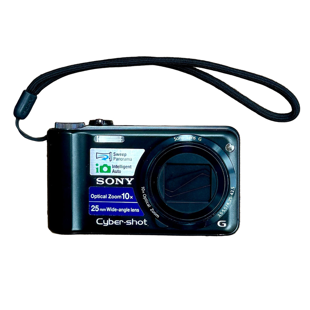 Sony Cyber-Shot DSC-H55 14.1MP Digital Camera w/ Case - Black Sony Cyber-shot digital camera on a wooden surface