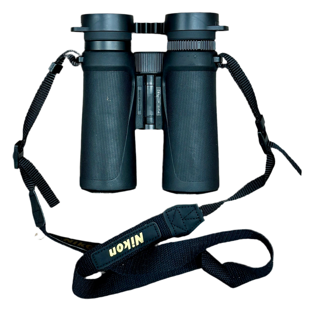 Nikon PROSTAFF 3S 10x42 7-Degree Waterproof Binoculars w/ Case & Caps Black binoculars with a Nikon strap on a white background