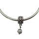 Pandora .925 Sterling Silver Flower Dangling Pearl Charm Silver bracelet with a floral charm and pearl bead on a white background