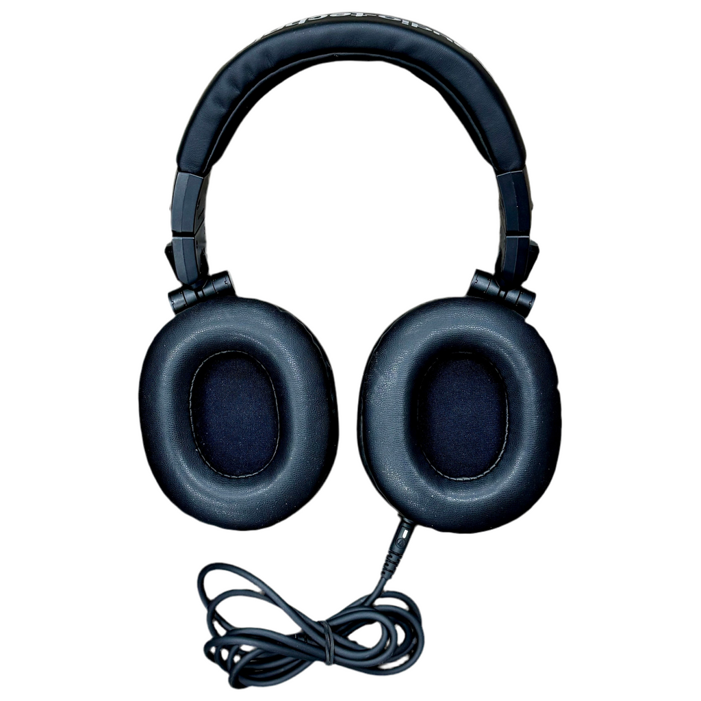 Audio-Technica ATH-M50x Professional Studio Monitor Headphones - Black headphones with a visible cable on a white background