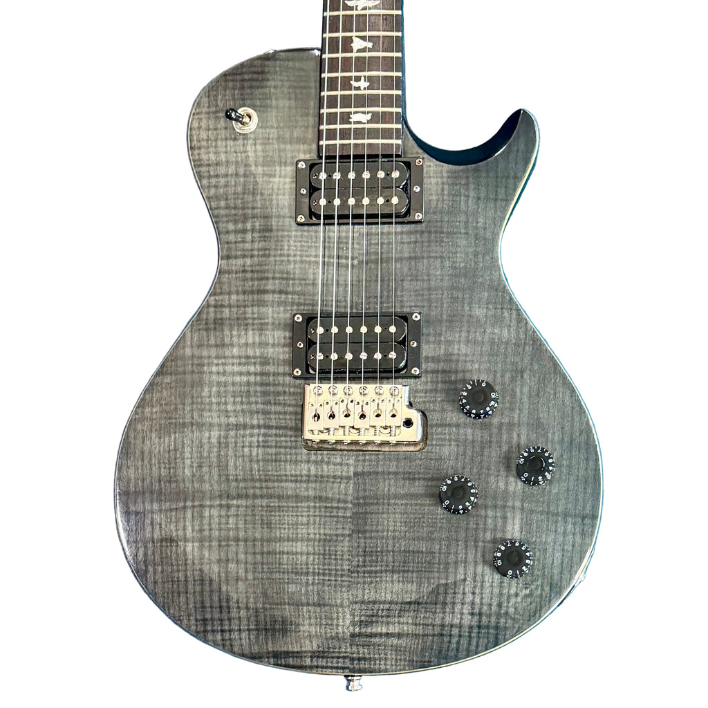 Paul Reed Smith PRS SE Tremonti Electric Guitar w/ Hard Case Electric guitar with a gray finish on a blue textured surface