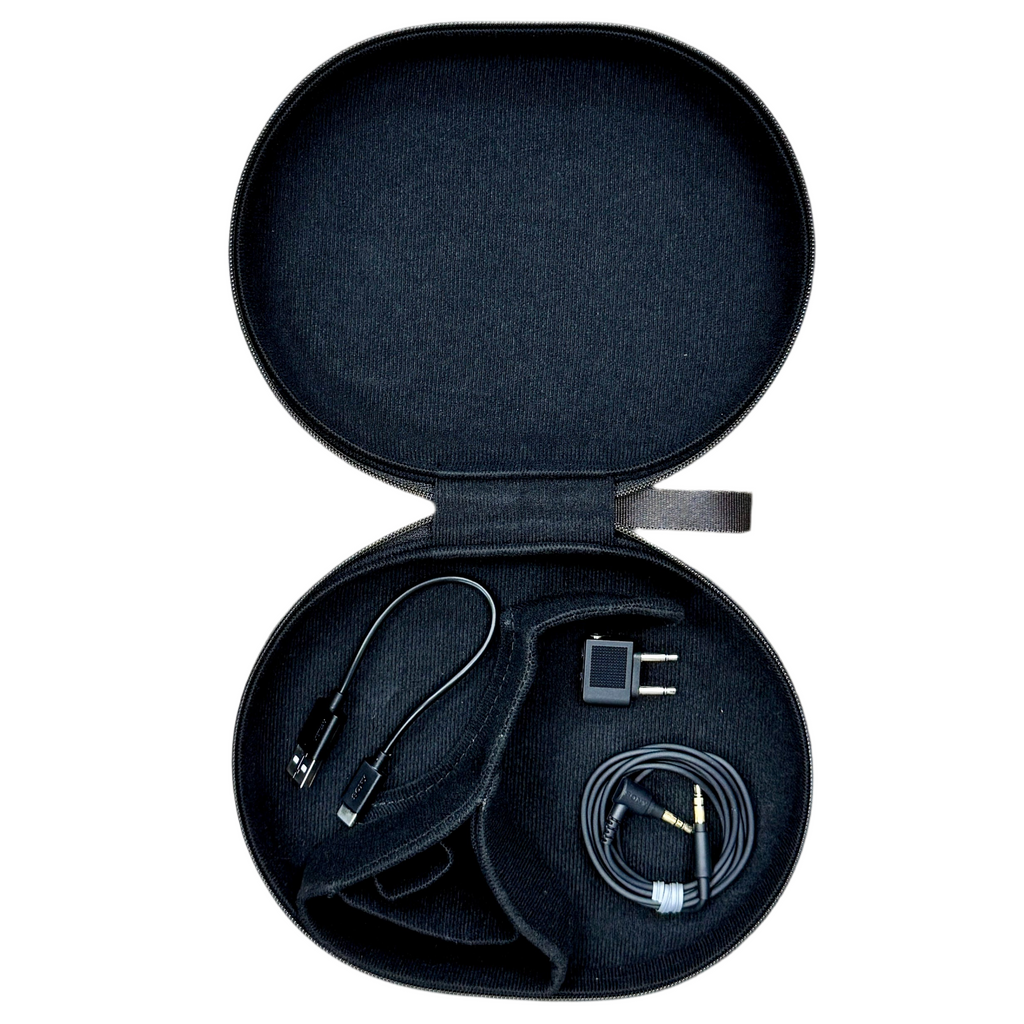 Sony WH-1000XM4 Premium Wireless Noise Canceling Headphones w/ Case - Black travel case with electronic accessories on a white background