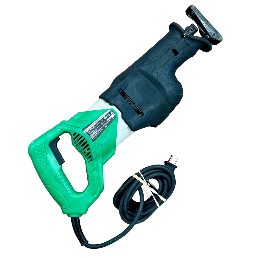 Hitachi 10-Amp 1-1/8" Stroke Corded Variable Speed Reciprocating Saw w/ Hard Case (CR13V2) Green and black oscillating tool with power cord on a wooden floor