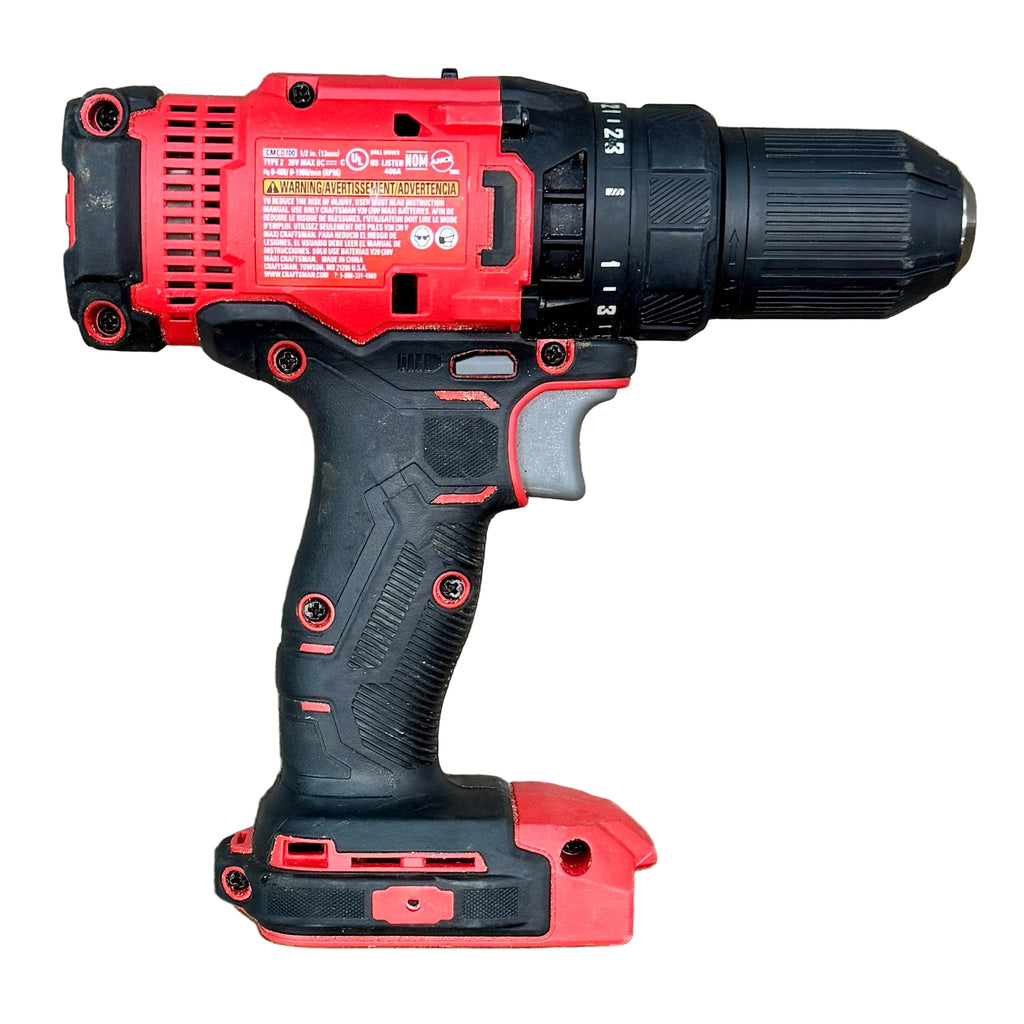 CRAFTSMAN V20 1/2" Cordless Drill/Driver w/ Battery & Charger (CMCD700) Red and black cordless drill on a wooden surface