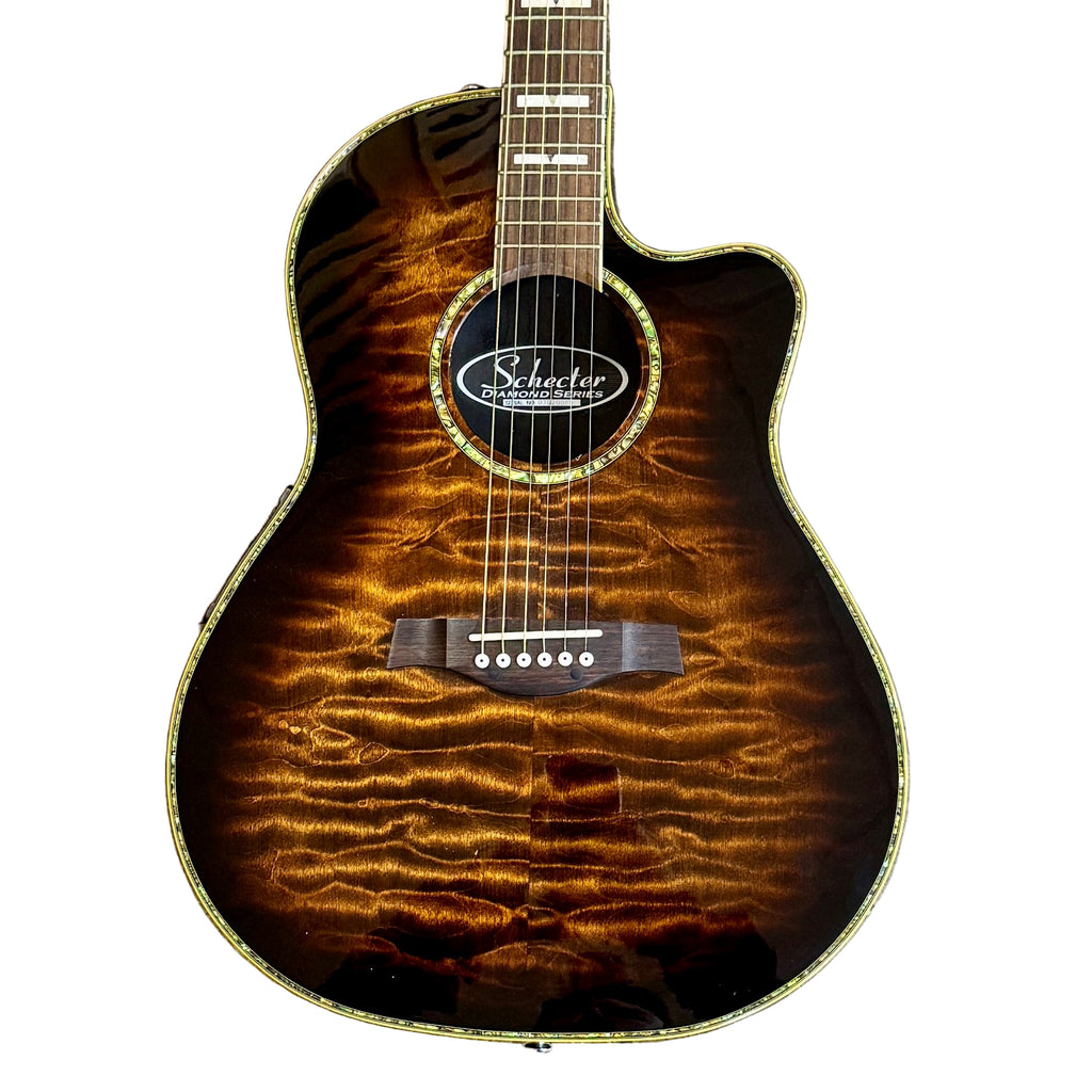 Schecter DIAMOND SERIES Acoustic-Electric Guitar w/ Hard Case Acoustic guitar with a tortoiseshell finish on a wooden floor