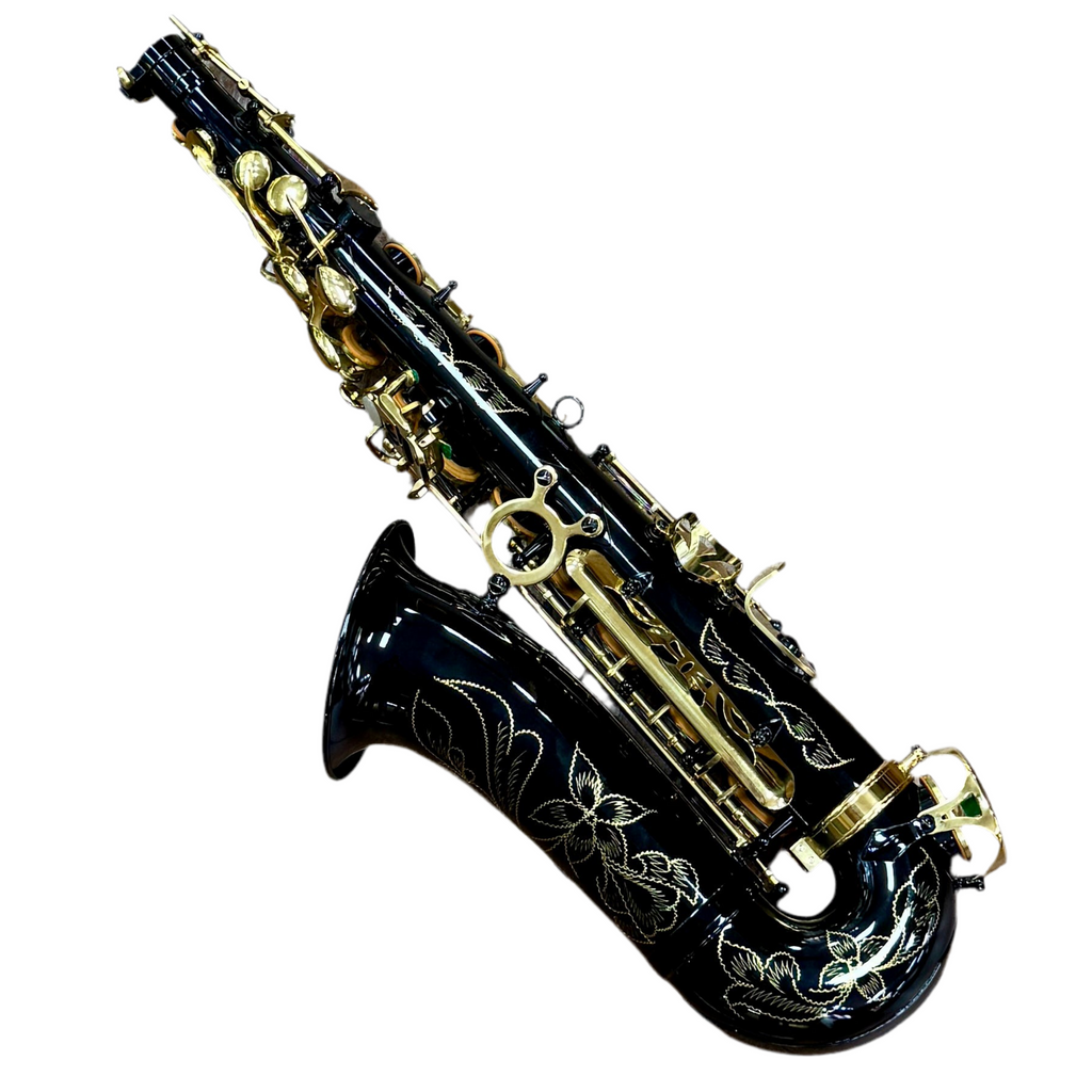 SLADE Eb Alto Saxophone w/ Case & Accessories Black and gold saxophone with decorative elements on a white background