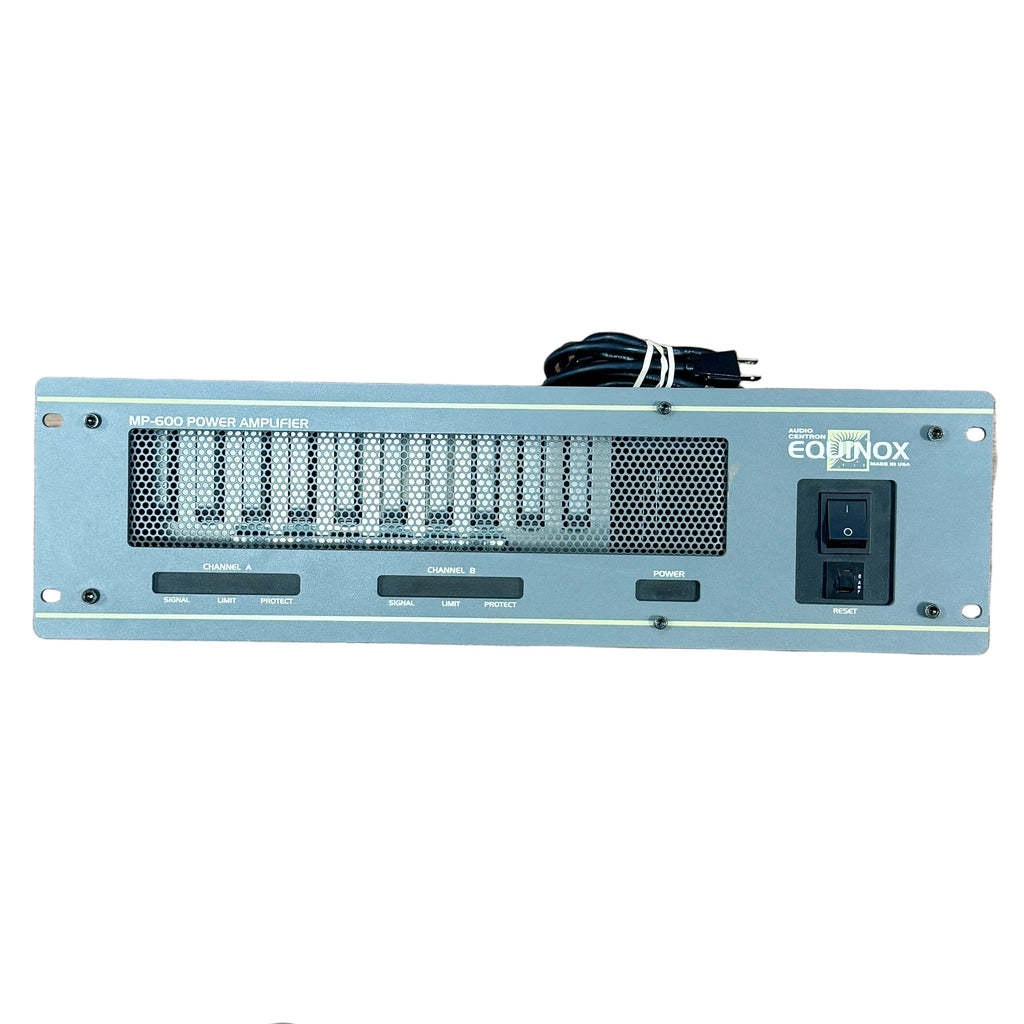 Audio Centron EQUINOX MP-600 Power Amplifier Electronic device labeled 'Equinox' on a wooden floor with shoes at the bottom.