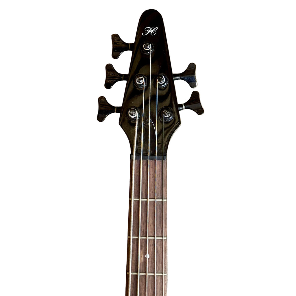 HOHNER PROFESSIONAL B Bass V 5-String Electric Bass Guitar Bass guitar headstock with tuning pegs on a wooden floor