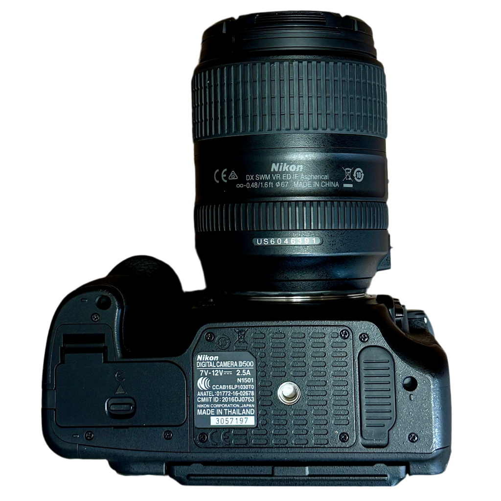 Nikon D500 DX-Format Digital SLR Camera w/ Nikon AF-S DX NIKKOR 18-300mm f/3.5-6.3G ED VR Lens Nikon camera with lens on a white background