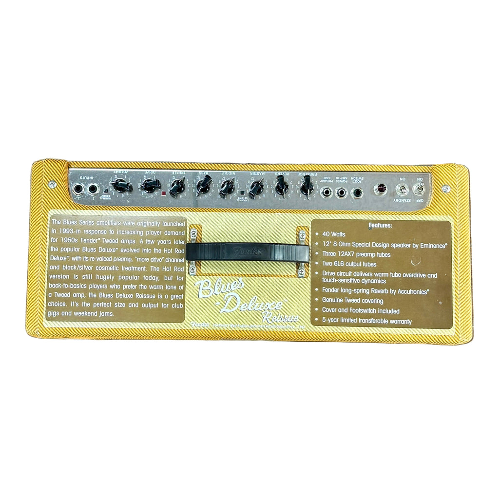 Fender Blues Deluxe Reissue Tweed Tube Guitar Combo Amplifier w/ Fender 2-Button Channel/Reverb Footswitch Yellow guitar amplifier on a wooden floor with feet wearing sneakers at the bottom.