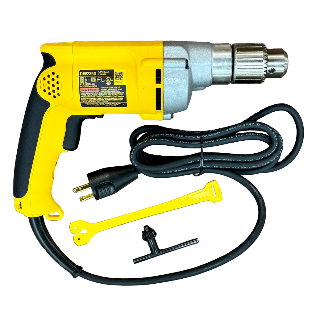 DeWalt 8.5-Amp 1/2" Corded VSR Drill (DW235G) Yellow and black drill with accessories on a wooden surface
