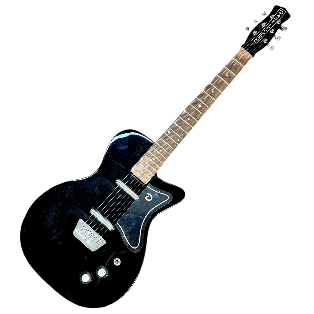Black danelectro '56 u2 electric guitar with a white pickguard on a white background