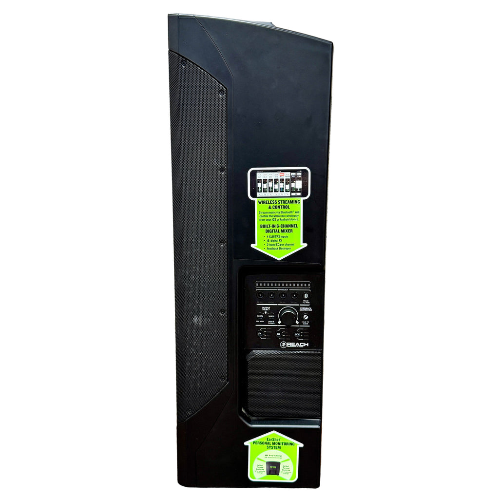 MACKIE REACH 750W Professional PA Speaker System w/ Carrying Case Black speaker with green label against a textured wall and wooden floor