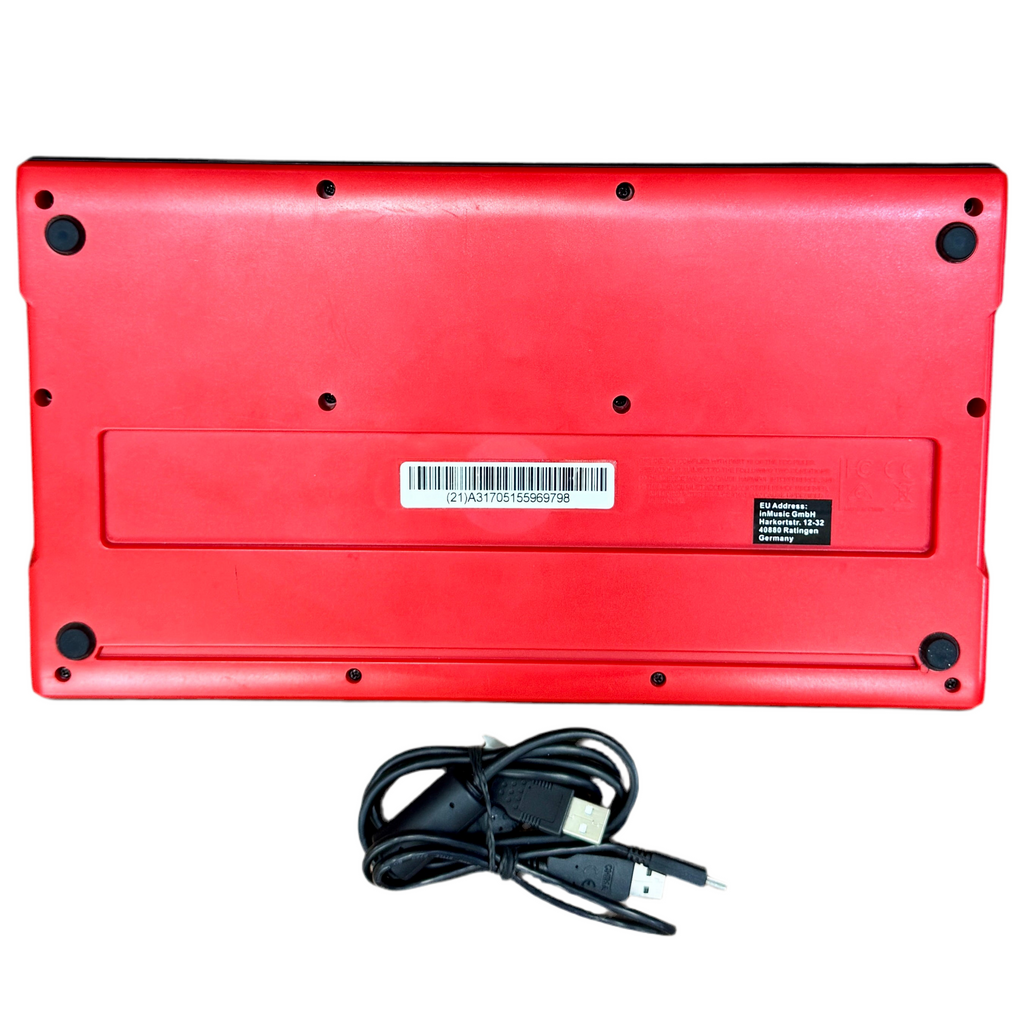 Akai Professional MPK Mini 25-Key Keyboard Controller Red electronic device with a cable on a white background