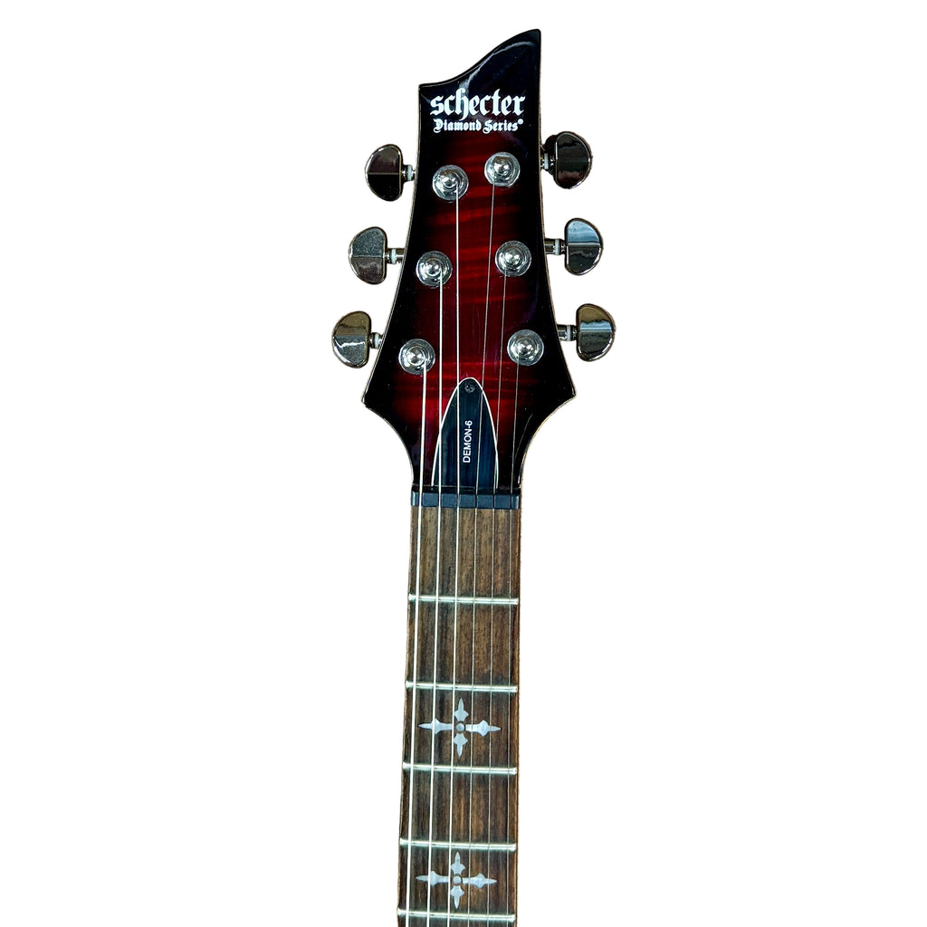 Schecter Diamond Series DEMON-6 Electric Guitar Guitar headstock with Schecter logo on a white background