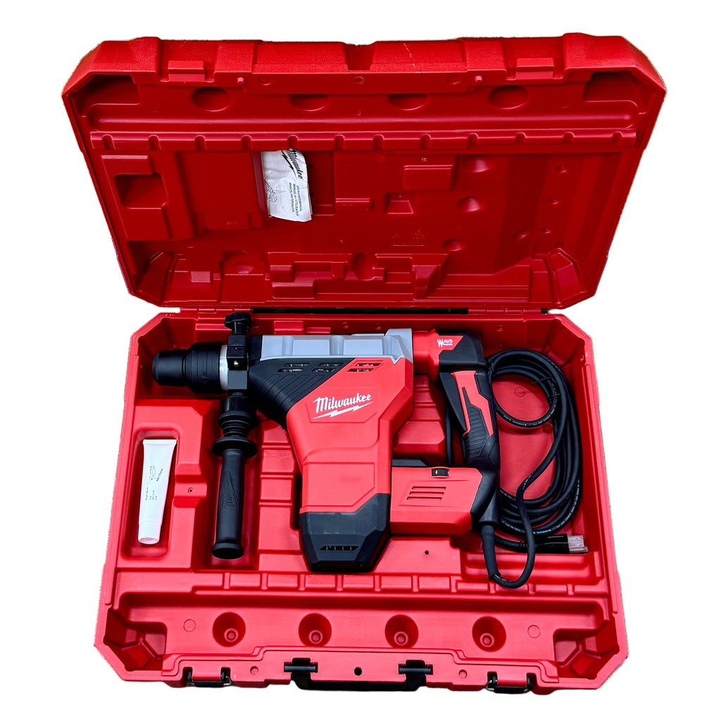 Milwaukee 15-Amp 1-3/4" Corded SDS MAX Rotary Hammer w/ Hard Case (5546-21) Red Milwaukee drill in a red case on a wooden floor