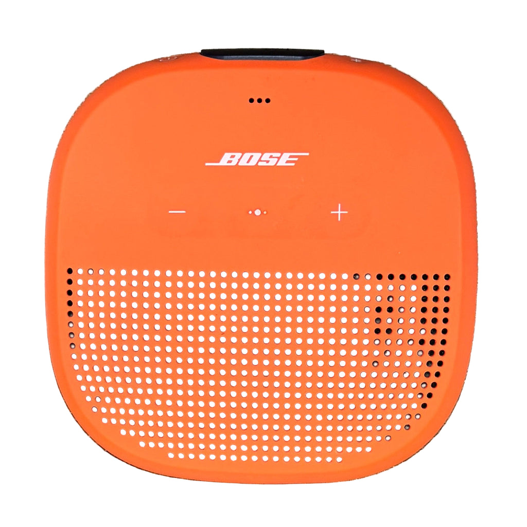 BOSE SoundLink Micro Portable Bluetooth Speaker - Orange Bose speaker on a wooden surface