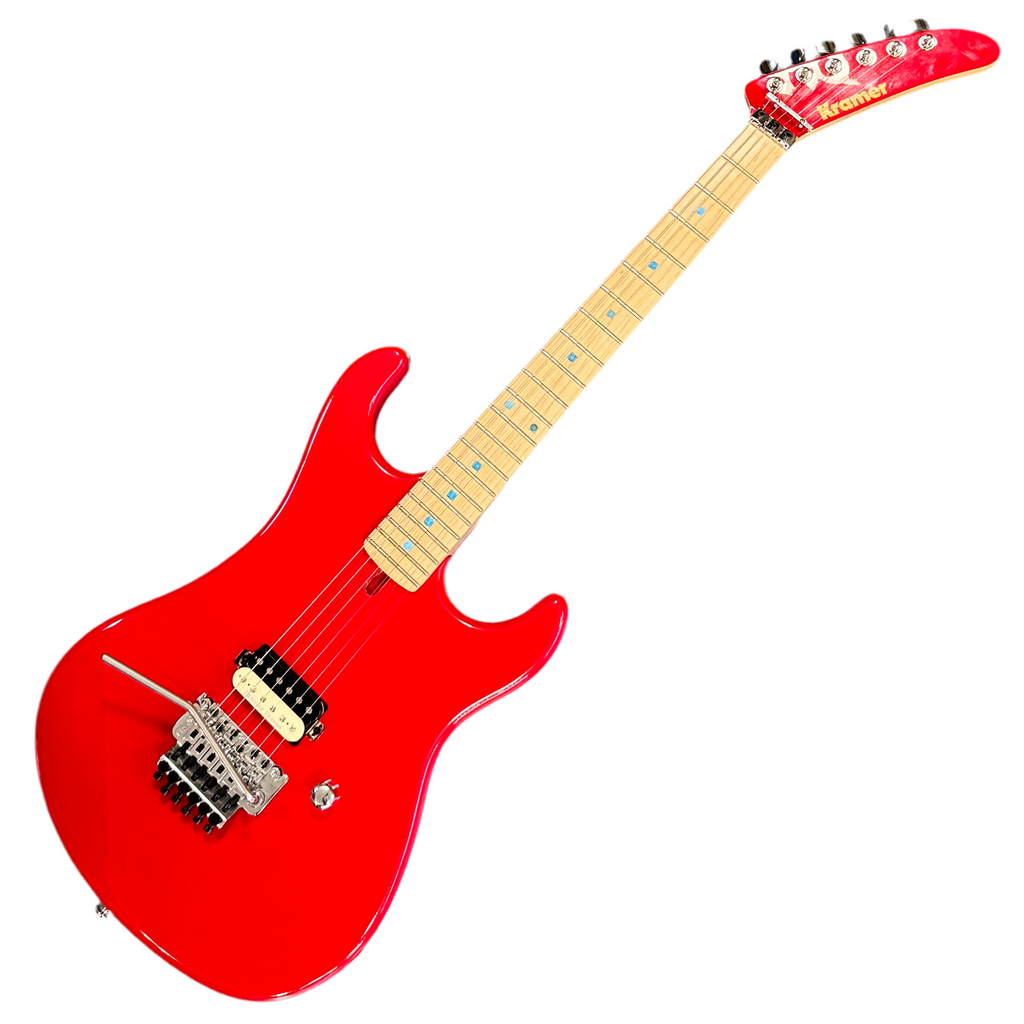Kramer The 84 Electric Guitar Red electric guitar with a white background