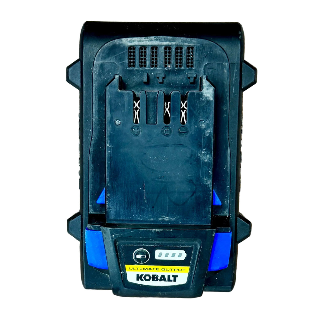 Kobalt ULTIMATE OUTPUT 24V MAX 8.0Ah Lithium Ion Battery Pack (KXB 824-03) Kobalt battery charger on a wooden surface