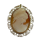 18K Yellow Gold Swirl Framed Pink and White Cameo Pendant/Brooch Cameo pendant with intricate gold frame on a white background