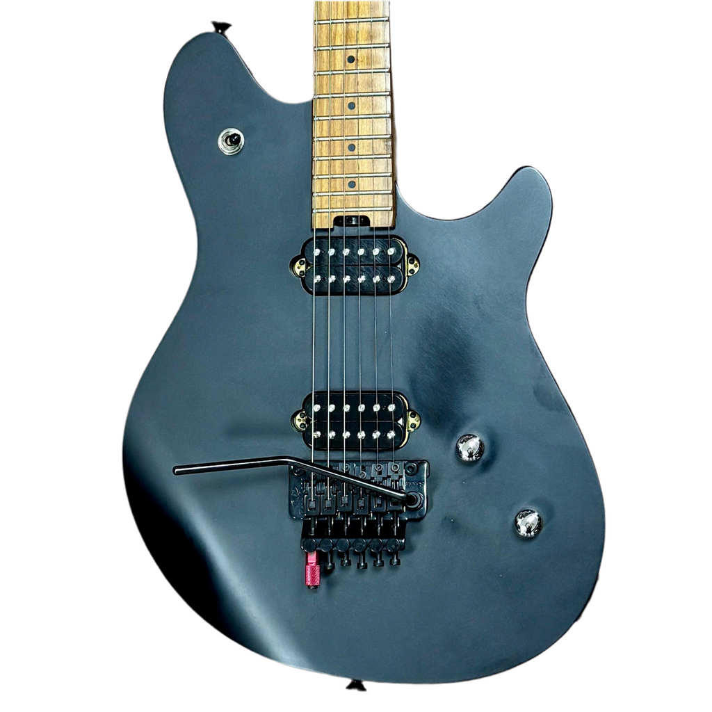 EVH Wolfgang WG Standard Electric Guitar Black electric guitar with a wooden fretboard on a white background