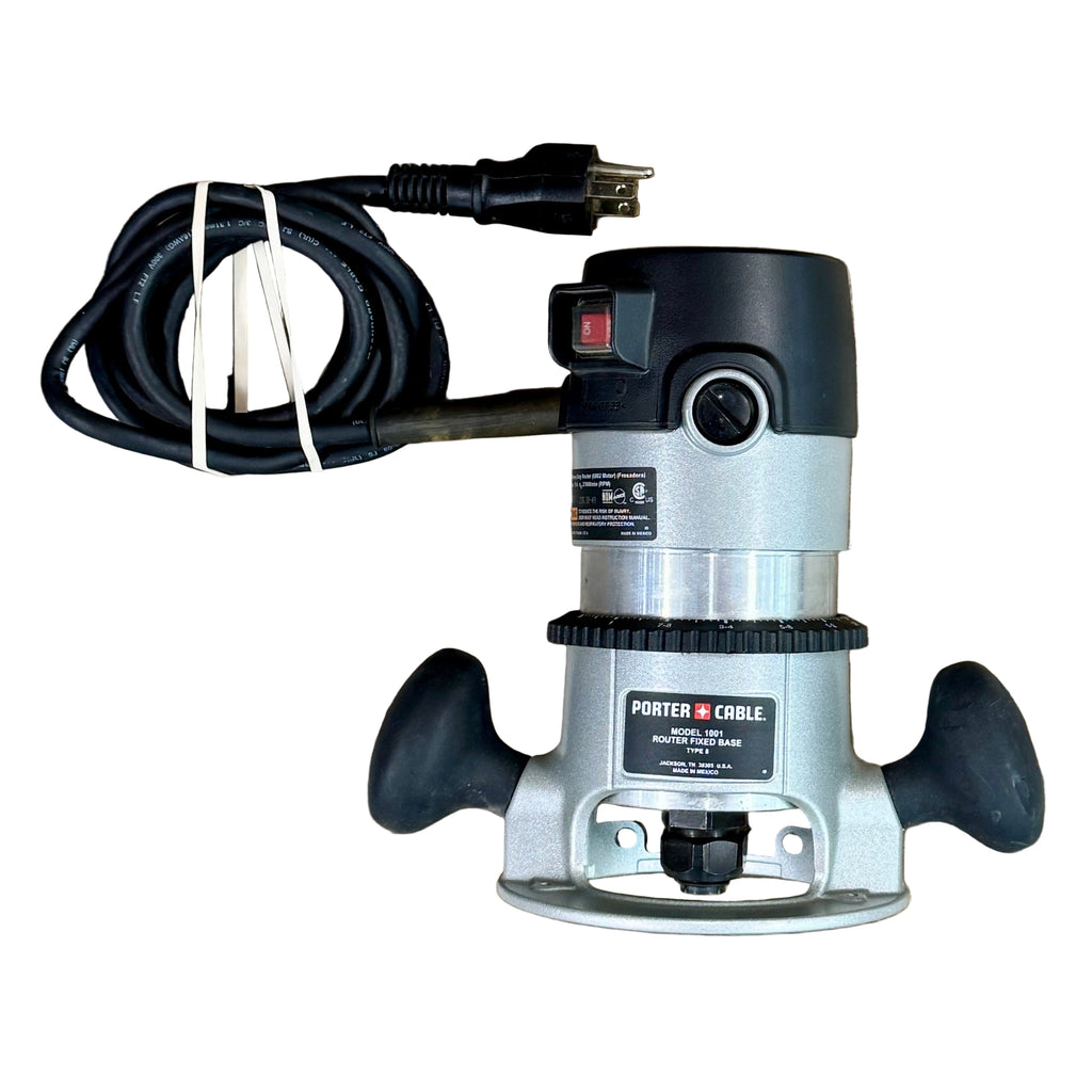 Porter-Cable 11-Amp 1-3/4 HP Corded Fixed-Based Router w/ Hard Case (690LR) Porter-Cable router with power cord on a wooden surface