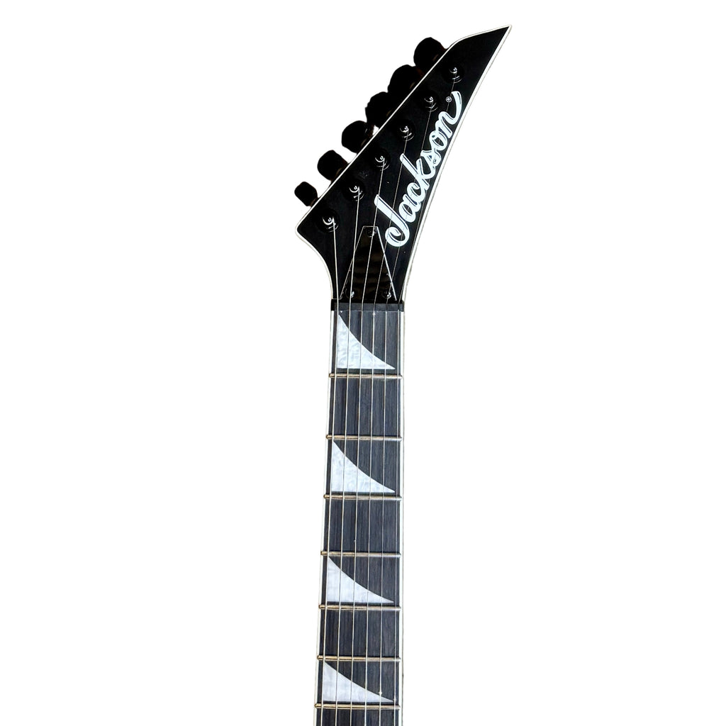 Jackson JS Series Dinky Arch Top JS22 DKA Electric Guitar neck with Jackson logo on a wooden floor