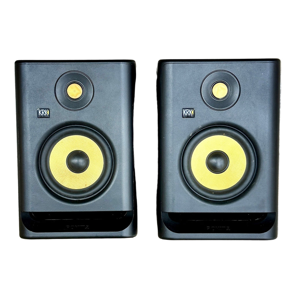 KRK SYSTEMS ROKIT 5 G4 Professional Bi-Amplified 5" Powered Studio Monitors (Pair) Pair of studio monitors on a wooden floor