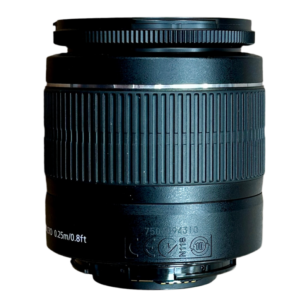 Canon EOS REBEL T3 12.2 MP CMOS Digital SLR Camera w/ Canon Zoom Lens EF-S 18-55mm f/3.5-5.6 IS II Lens & Case Black camera lens on a white background