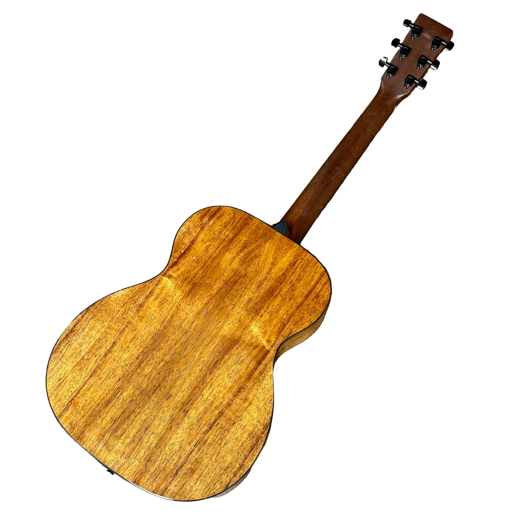 Martin Road Series 000-12E Acoustic-Electric Guitar w/ Soft Case Wooden ukulele on a wooden floor