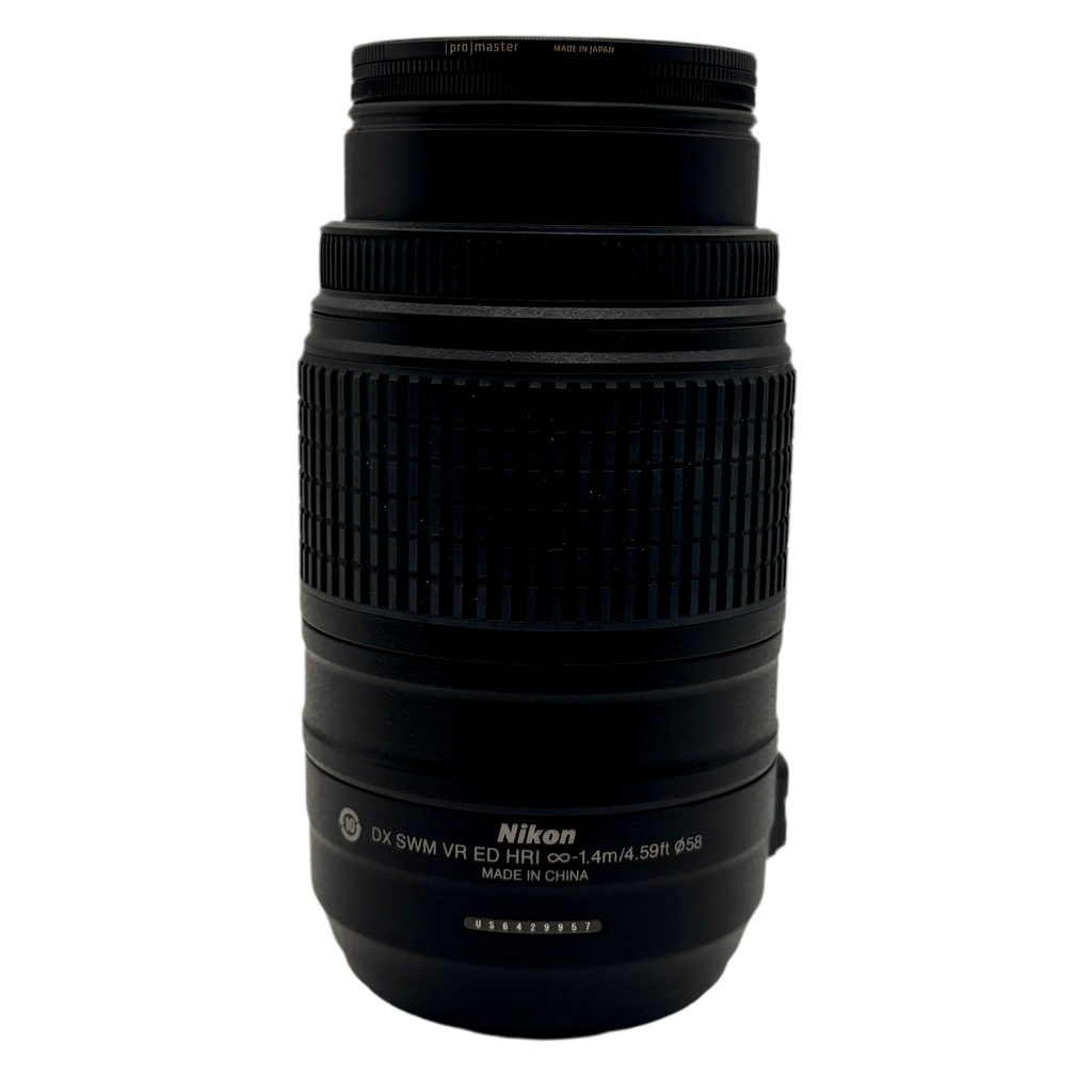Nikon DX AF-S NIKKOR 55-300mm f/4.5-5.6G ED Camera Lens Black Nikon camera lens on a white background