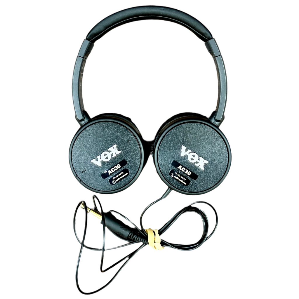 VOX VGH-AC30 Guitar Amplifier Headphones - Black VOX headphones with a coiled cable on a white background