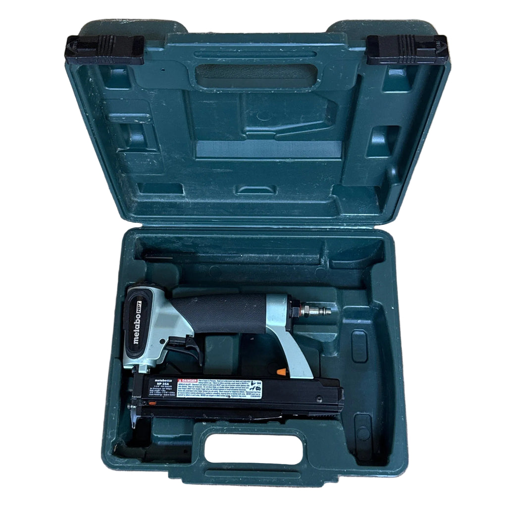 Metabo HPT 23-Gauge 1-3/8" Pneumatic Micro Pin Nailer w/ Hard Case (NP35A) Green tool case with a nail gun on a wooden floor