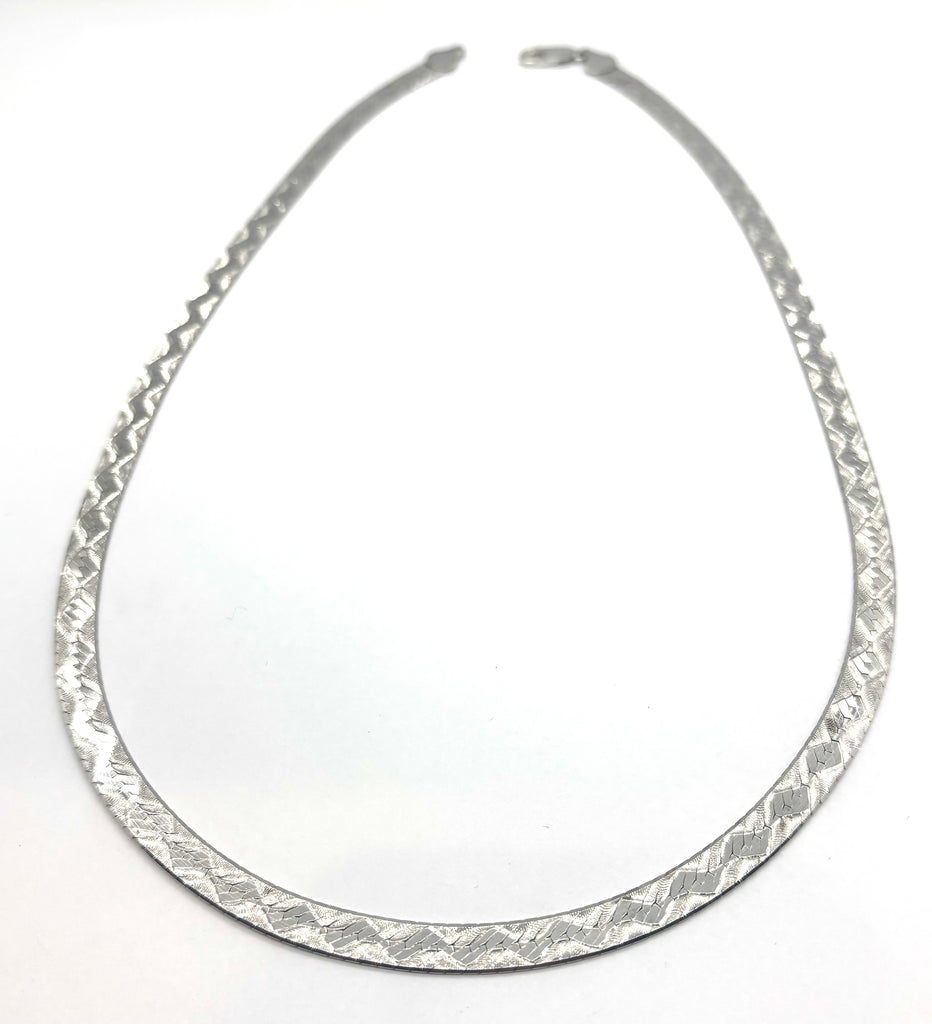 Silver necklace on a white background