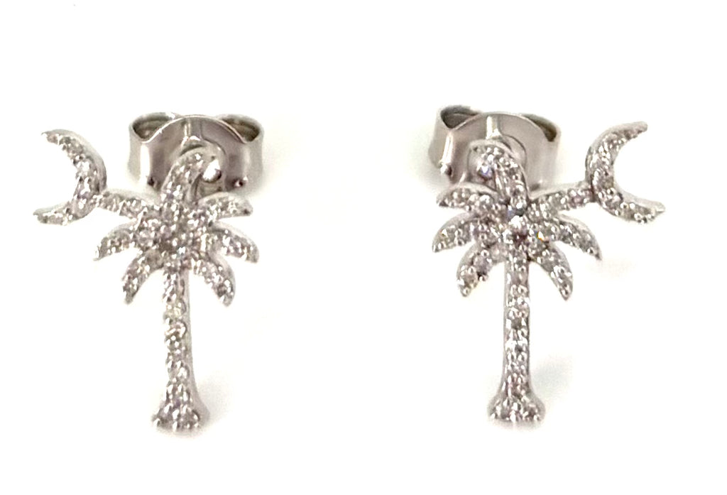 Silver palm tree earrings on a white background