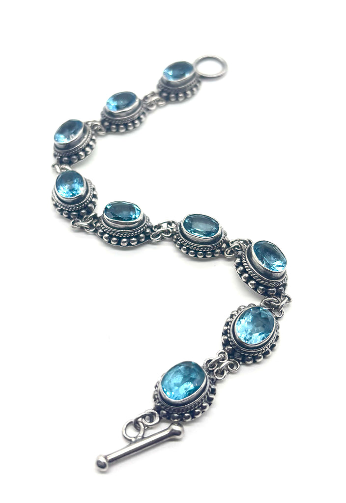 .925 Blue Topaz Oval Link Bracelet