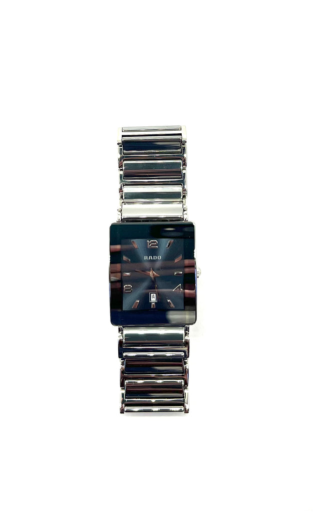 Rectangular smartwatch with metallic band on a white background