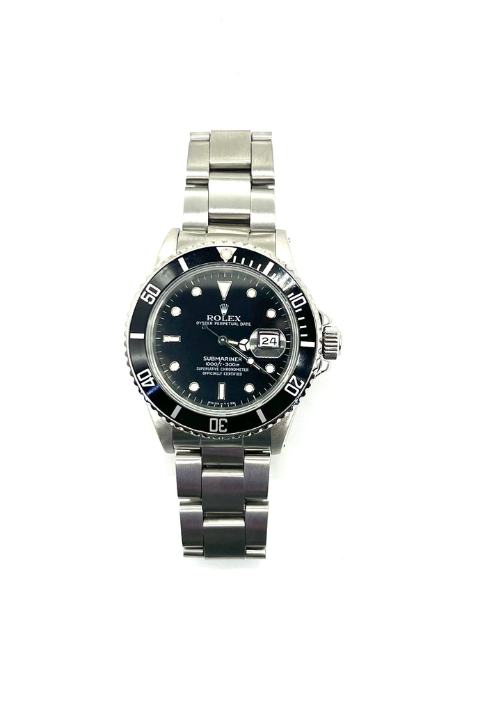 Silver watch with a black face on a white background