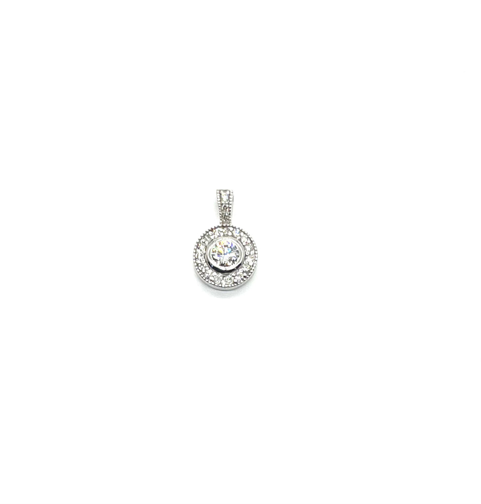 Silver pendant with clear stones on a white background
