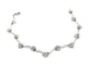 Silver necklace with star-shaped pendants on a white background