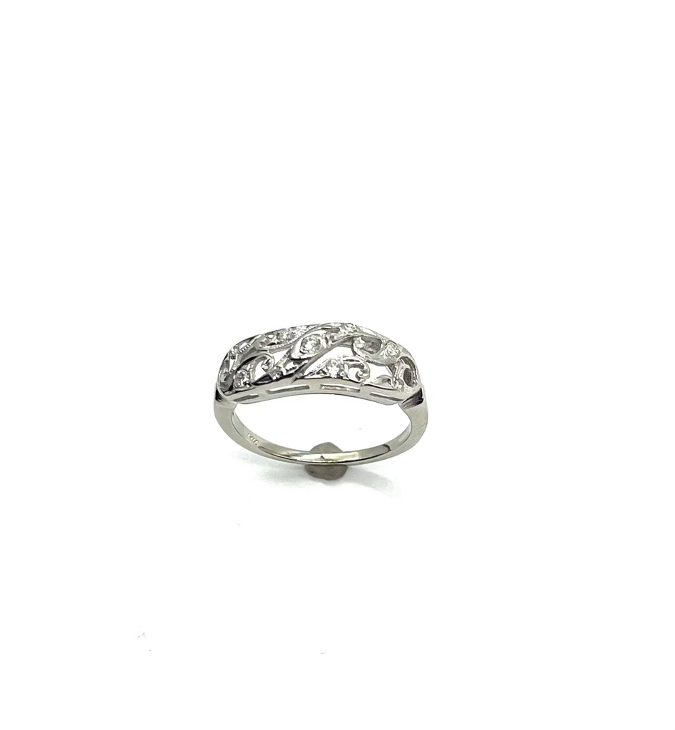 Silver ring with gemstones on a white background