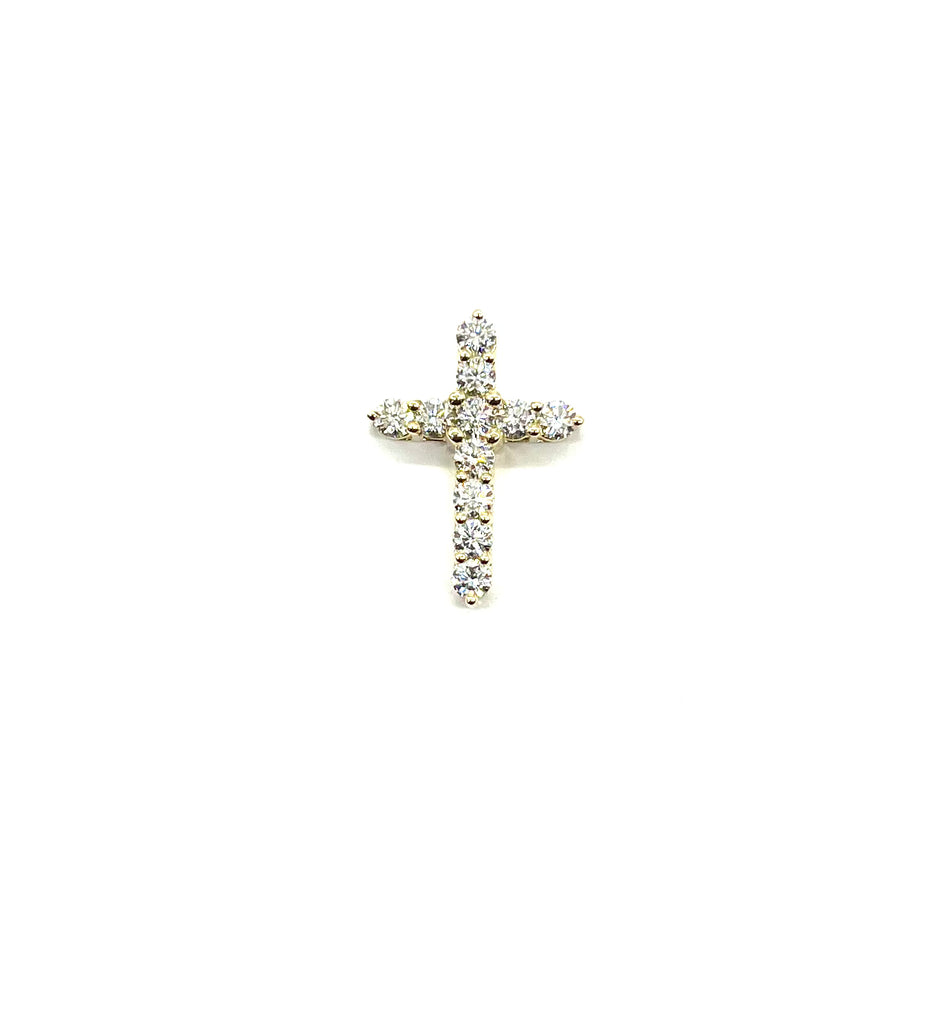 Gold cross earring with clear stones on a white background