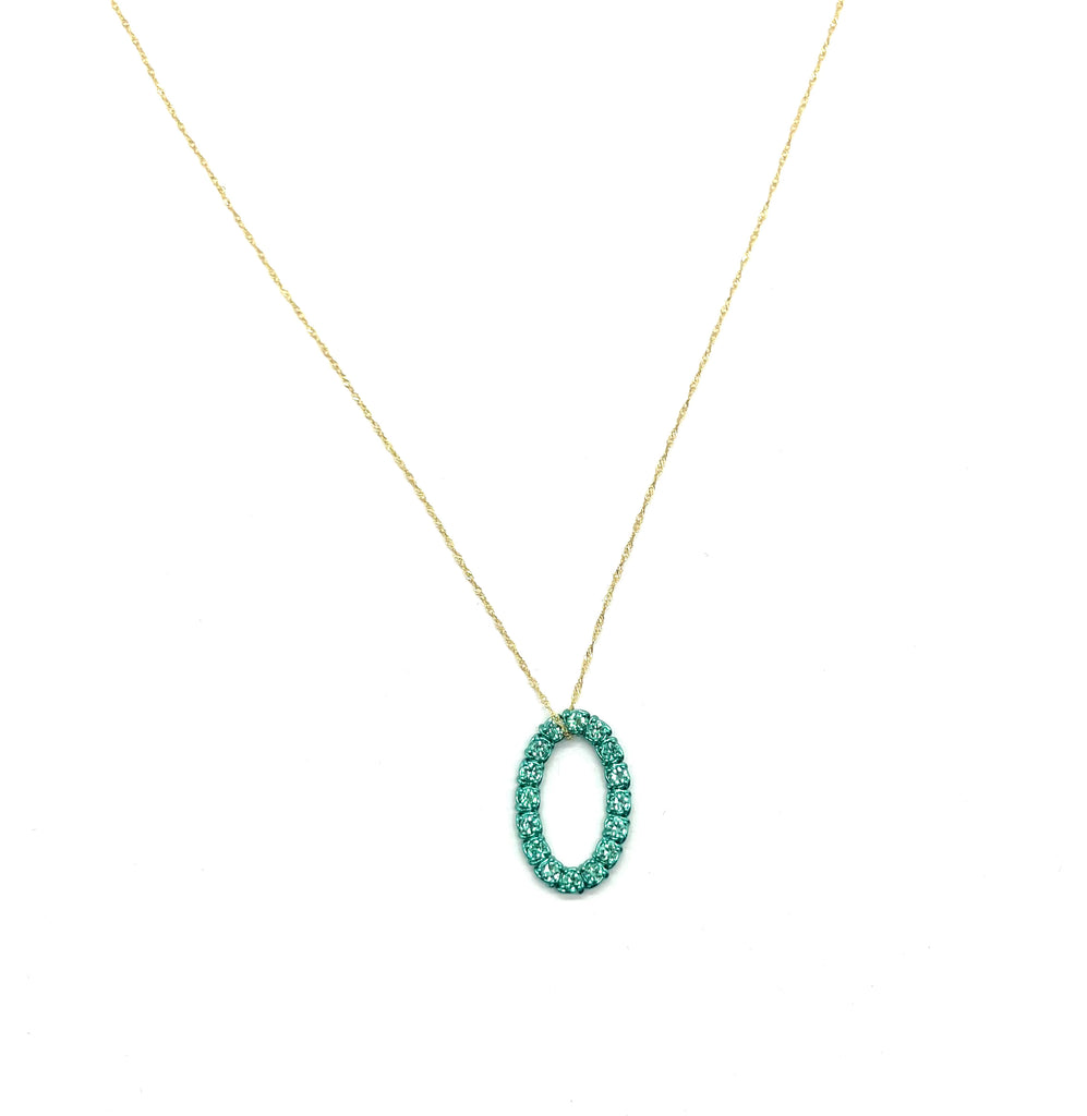 Necklace with a green pendant on a white background