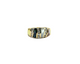 Gold ring with black and white stone design on a white background